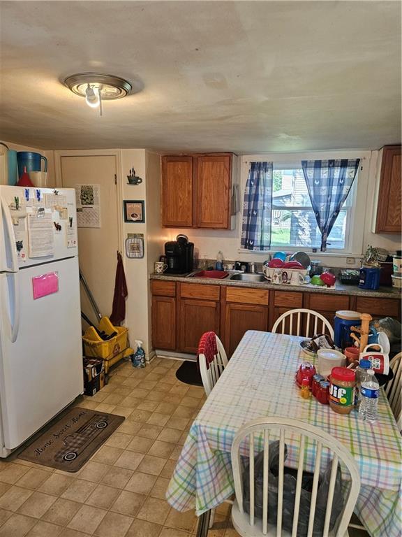 113 Hillside Way New Castle, PA 16101 - Photo 9 of 18 a bedroom with a bed a window and gym equipment