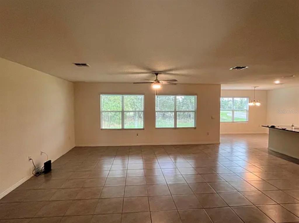 5 Hickory Course Loop Ocala, FL 34472 - Photo 2 of 10 a view of an empty room with a window