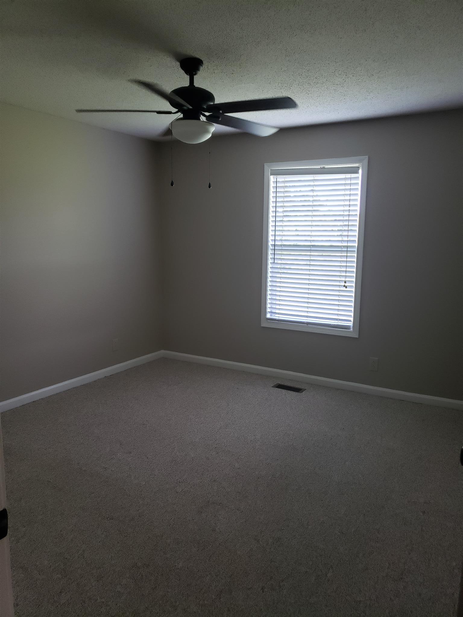 113 Waterford Drive Oak Grove, KY 42262 - Photo 12 of 13 an empty room with a window