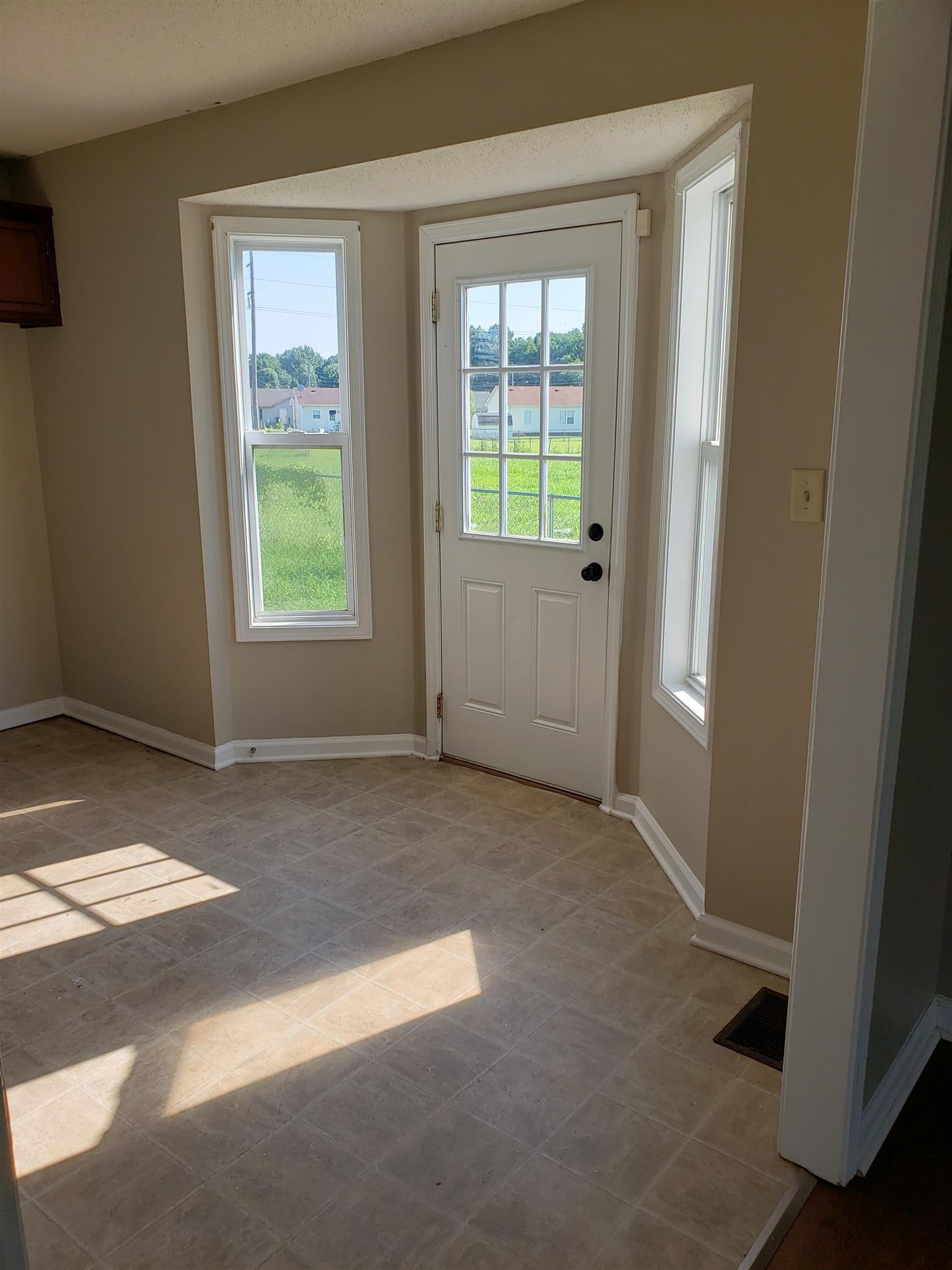 113 Waterford Drive Oak Grove, KY 42262 - Photo 5 of 13 an empty room with windows