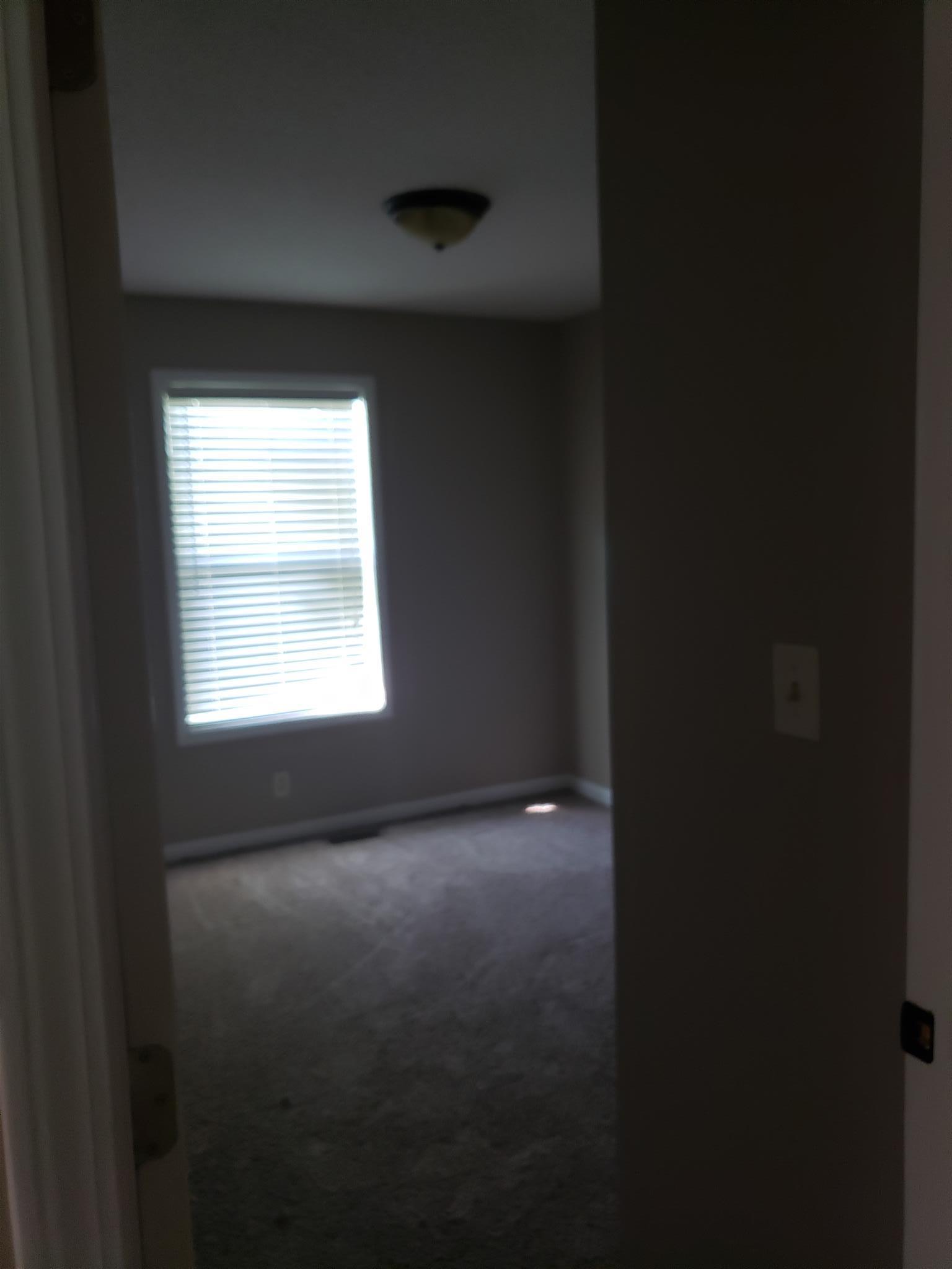 113 Waterford Drive Oak Grove, KY 42262 - Photo 8 of 13 a view of an empty room and a window