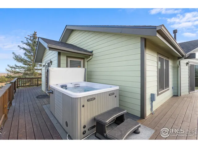 a view of a house with a sink and wooden floor