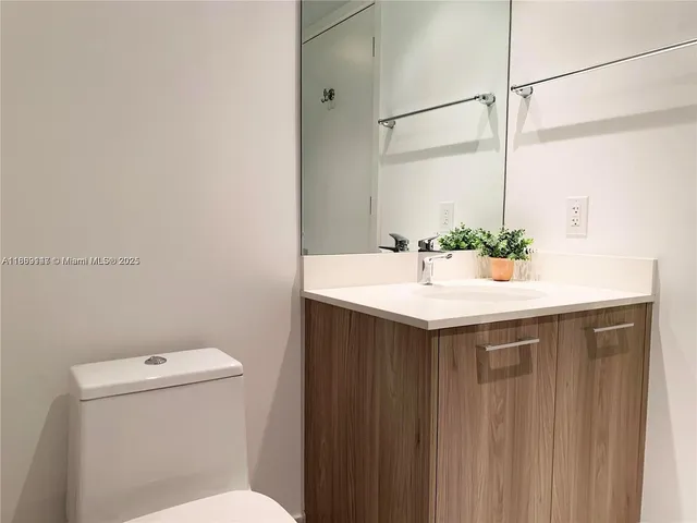 a bathroom with a sink and a toilet