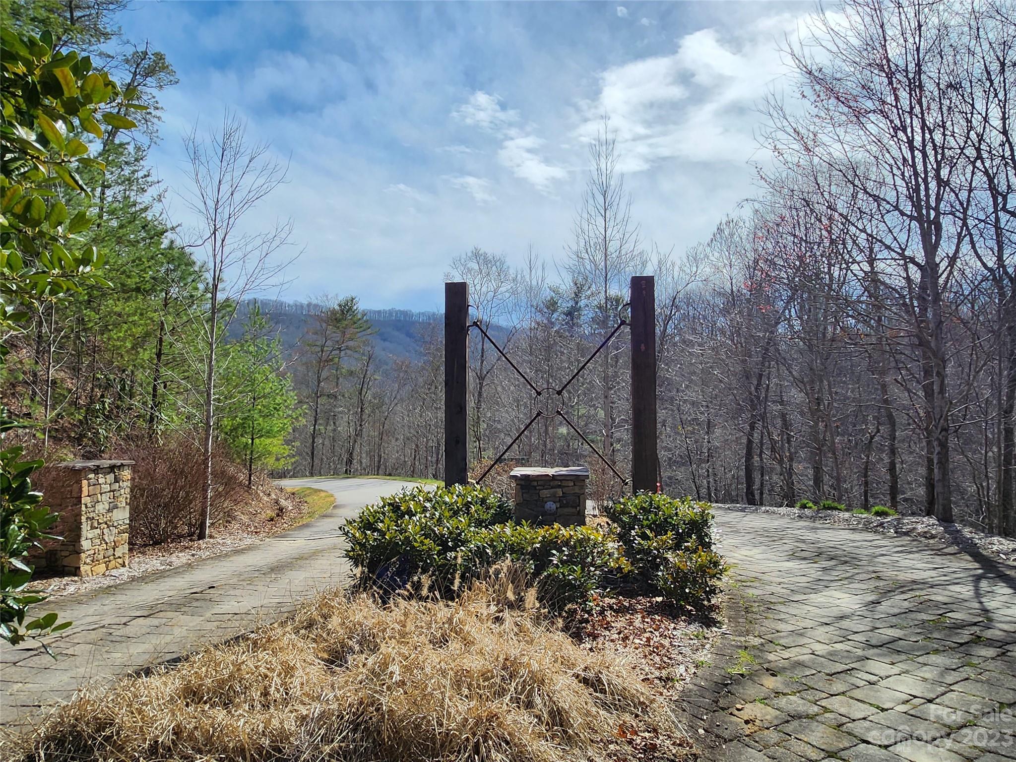 435 Pine Cone Trail Marshall, NC 28753 - Photo 14 of 34 a backyard of a house with lots of green space