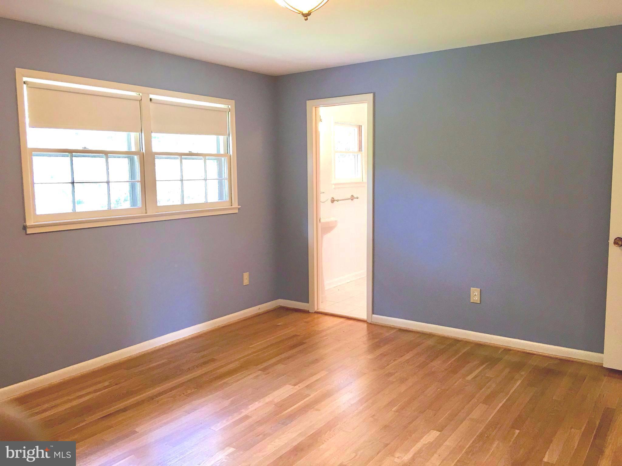 1003 Dead Run Drive McLean, VA 22101 - Photo 9 of 26 a view of empty room with wooden floor