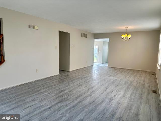72 Bentwood Drive Westampton, NJ 08060 - Photo 11 of 48 a view of an empty room with wooden floor and window