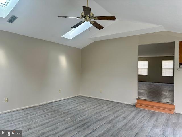 72 Bentwood Drive Westampton, NJ 08060 - Photo 13 of 48 an empty room with wooden floor fan and windows