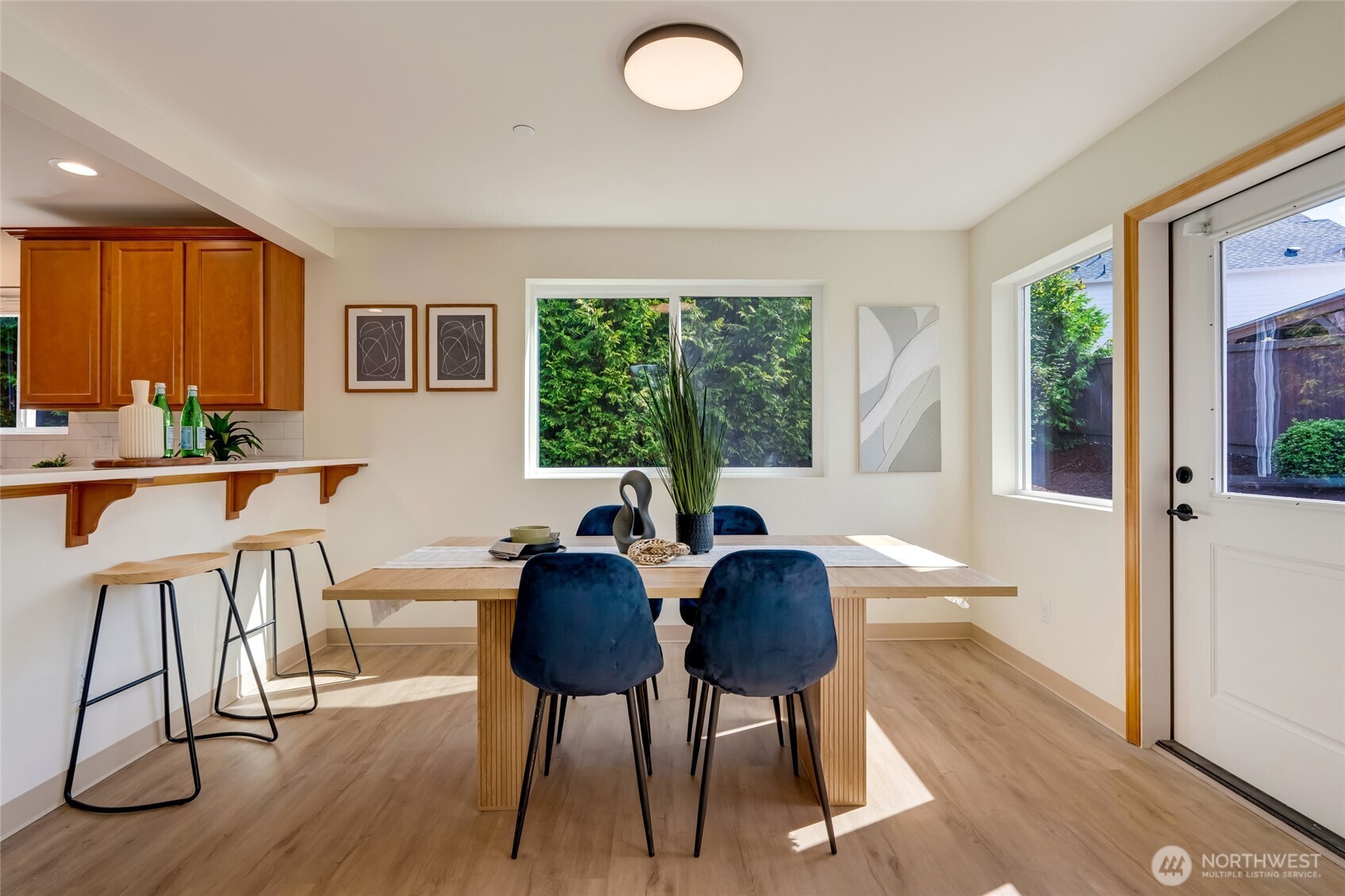 3910 132nd Street Southwest, Unit B Lynnwood, WA 98087 - Photo 11 of 30 a view of a dining room with furniture window and outside view