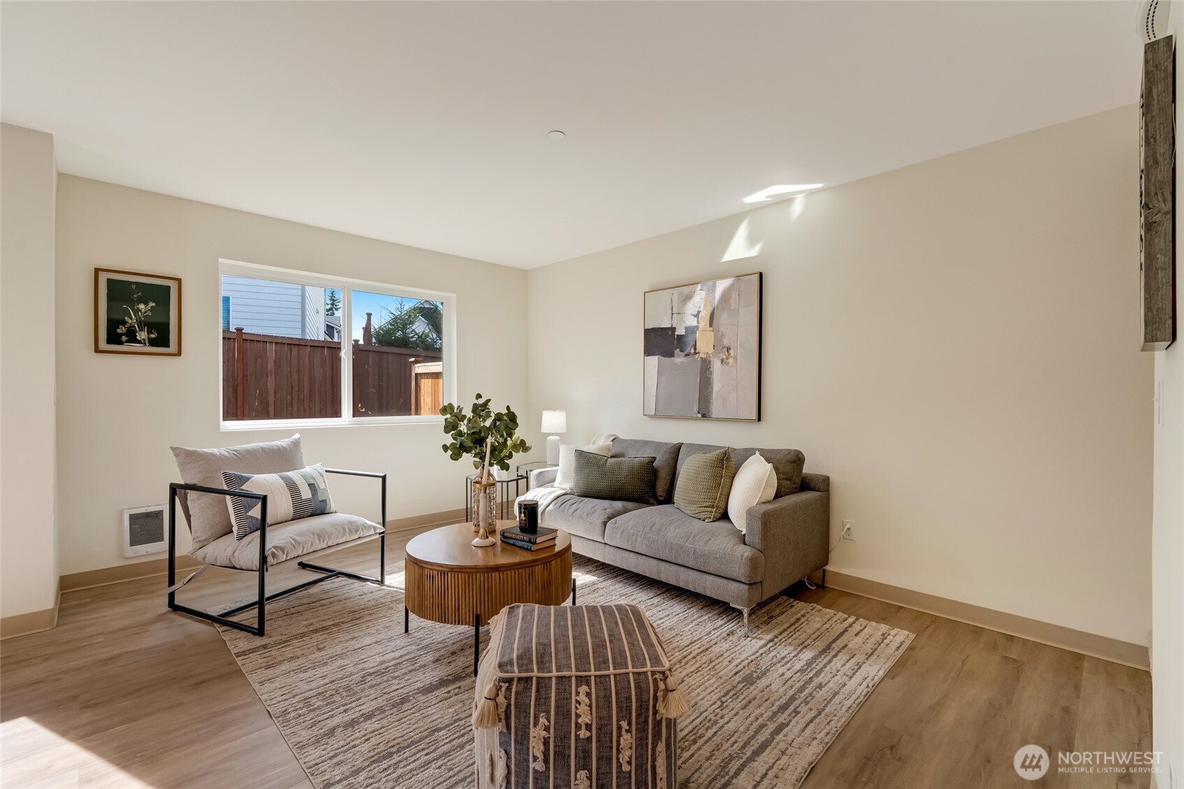 3910 132nd Street Southwest, Unit B Lynnwood, WA 98087 - Photo 13 of 30 a living room with furniture a rug and a window