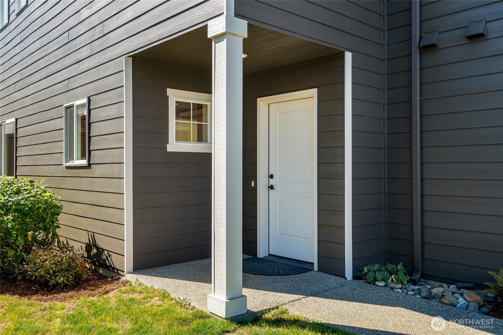 3910 132nd Street Southwest, Unit B Lynnwood, WA 98087 - Photo 5 of 30 a view of yellow house with a yard