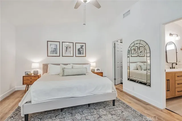 a living room with furniture and large windows