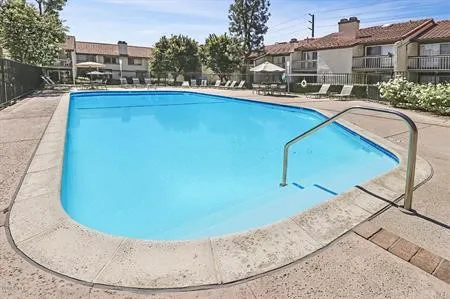 an aerial view of a swimming pool