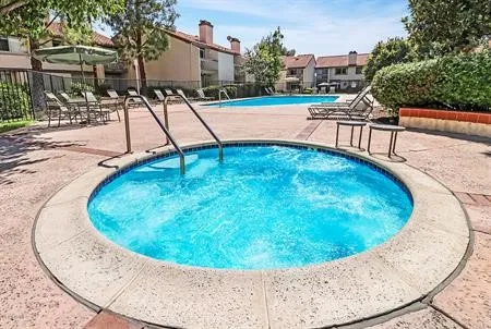 an aerial view of a house with a garden