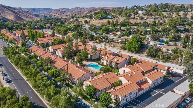 an aerial view of a house with a garden