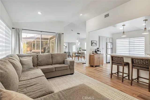 a kitchen with a sink stove and microwave