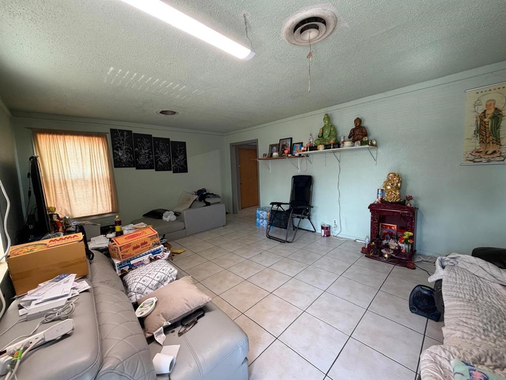 4501 Parrish Road Haltom City, TX 76117 - Photo 21 of 27 a room with furniture