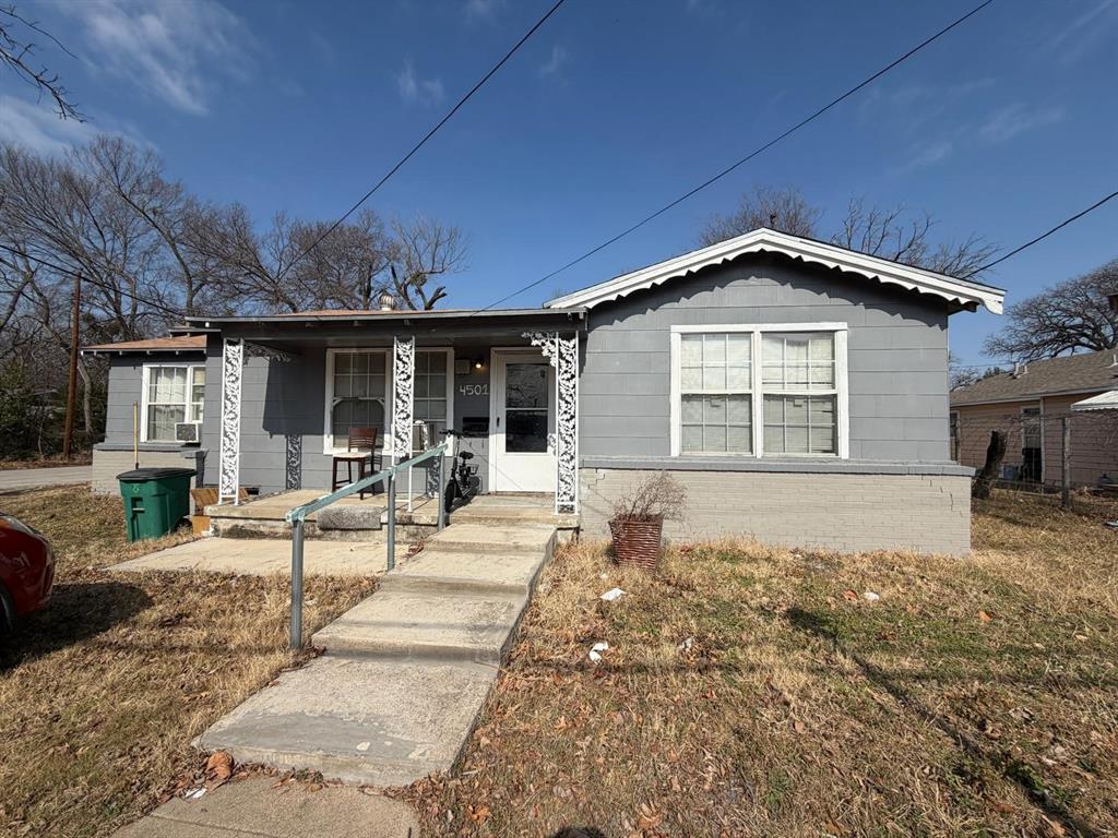4501 Parrish Road Haltom City, TX 76117 - Photo 4 of 27 a front view of a house with a yard