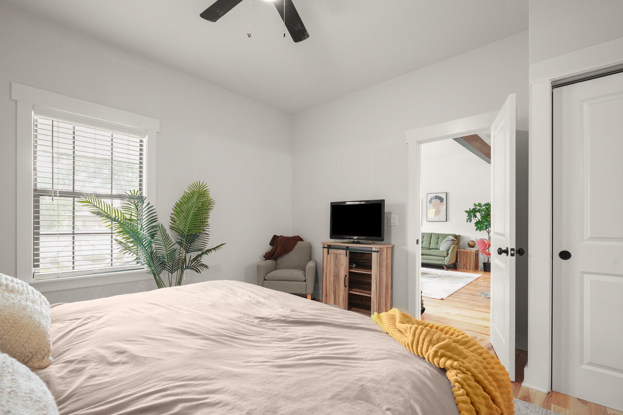 301 Old Thorndale Road Taylor, TX 76574 - Photo 20 of 29 Well-lit room with ample natural light and a view into an adjacent living space.