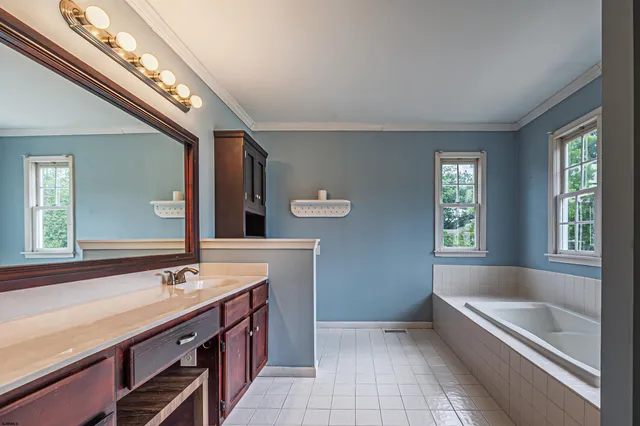 wooden floor with white walls