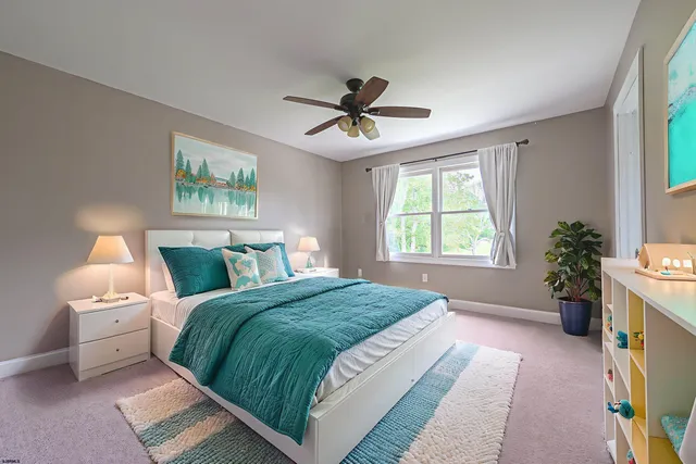 a bathroom with a sink a mirror and a shower