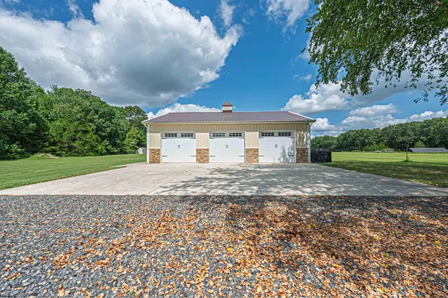 a workspace with white cabinets