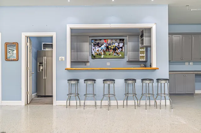 a view of a livingroom with furniture and window
