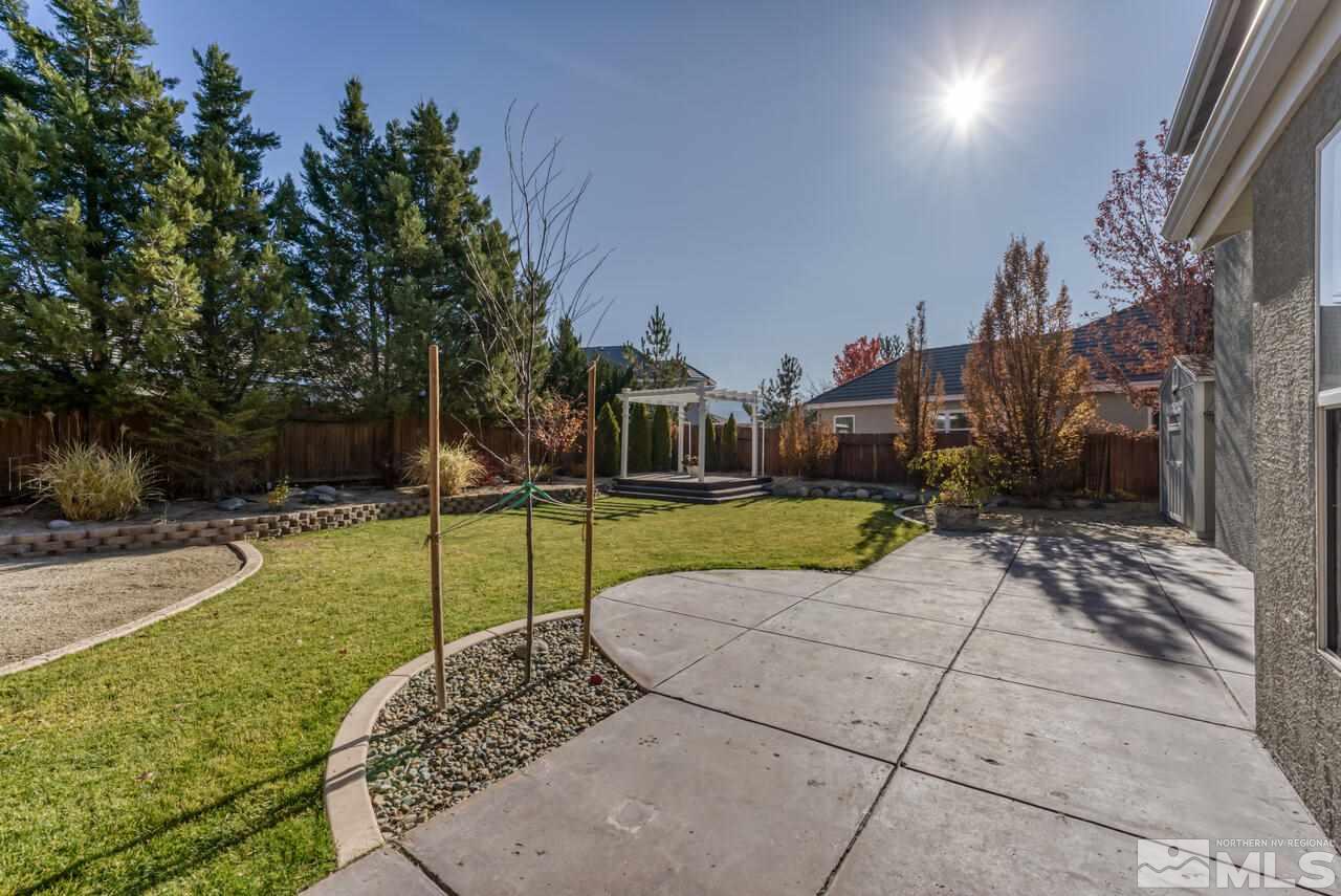 9720 Lemke Court Reno, NV 89521 - Photo 34 of 40 a view of a house with backyard
