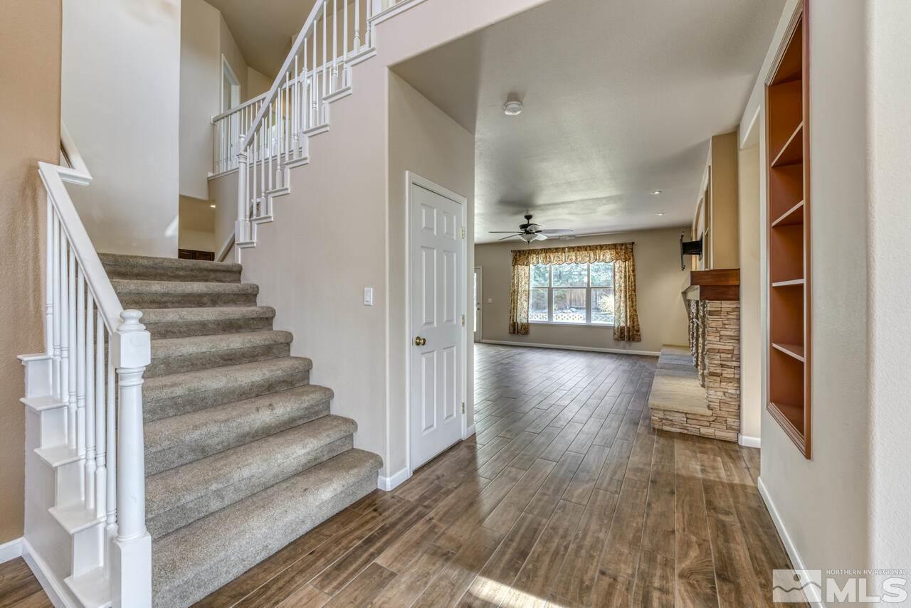 9720 Lemke Court Reno, NV 89521 - Photo 8 of 40 a view of entryway and hall with wooden floor