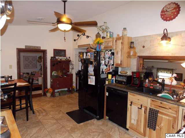 1222 Summerdean Road Middlebrook, VA 24459 - Photo 20 of 42 a kitchen view of a dining table chairs and chandelier