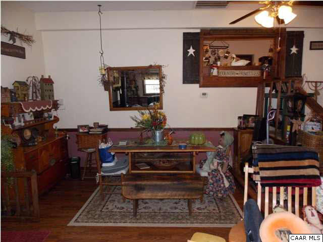 1222 Summerdean Road Middlebrook, VA 24459 - Photo 31 of 42 a room with lots of frames and chairs