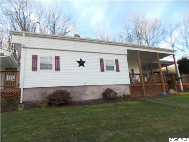 1222 Summerdean Road Middlebrook, VA 24459 - Photo 5 of 42 a front view of a house with garden