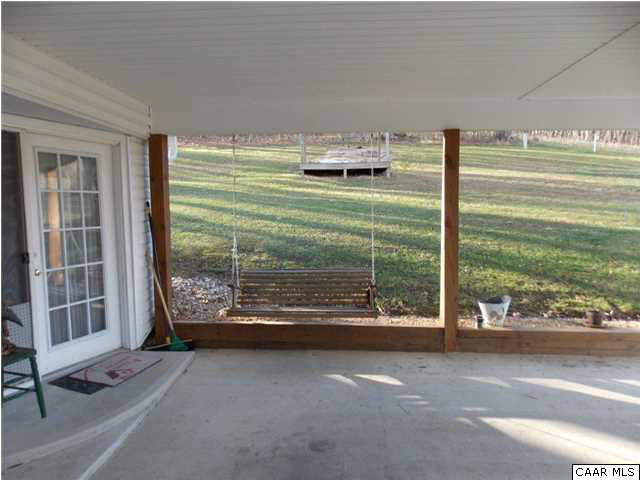 1222 Summerdean Road Middlebrook, VA 24459 - Photo 9 of 42 a view of a room with wooden floor and iron stairs