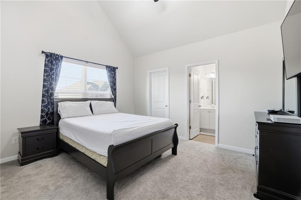 175 Paxton Lane Jefferson, GA 30549 - Photo 31 of 39 a bedroom with a bed and a tv