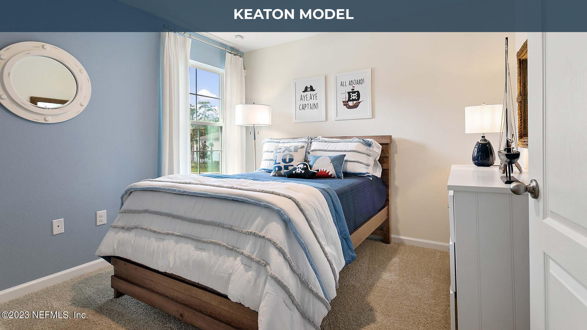 429 Seaport Breeze Road St. Augustine, FL 32095 - Photo 15 of 34 a bedroom with a bed and a painting on the wall