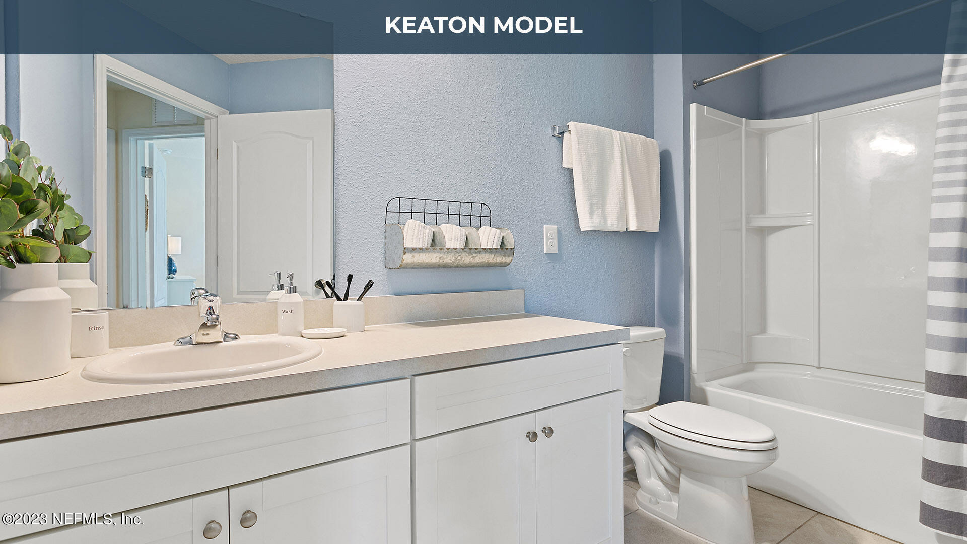 429 Seaport Breeze Road St. Augustine, FL 32095 - Photo 17 of 34 a bathroom with a sink a toilet and shower