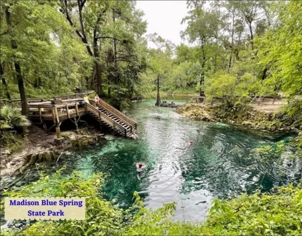 a view of a lake with a building in the background