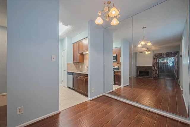 a view of a kitchen and a chandelier