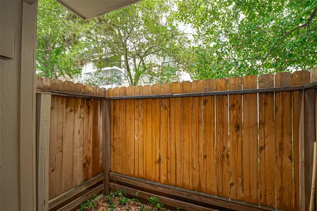a view of a wooden fence