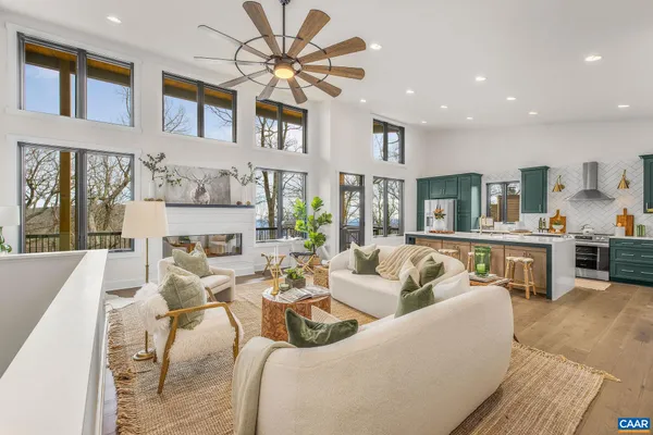 a kitchen with stainless steel appliances granite countertop a stove and a refrigerator