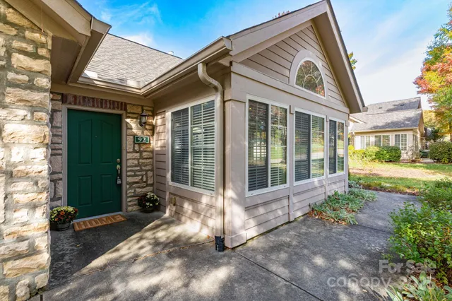 a front view of a house with a porch
