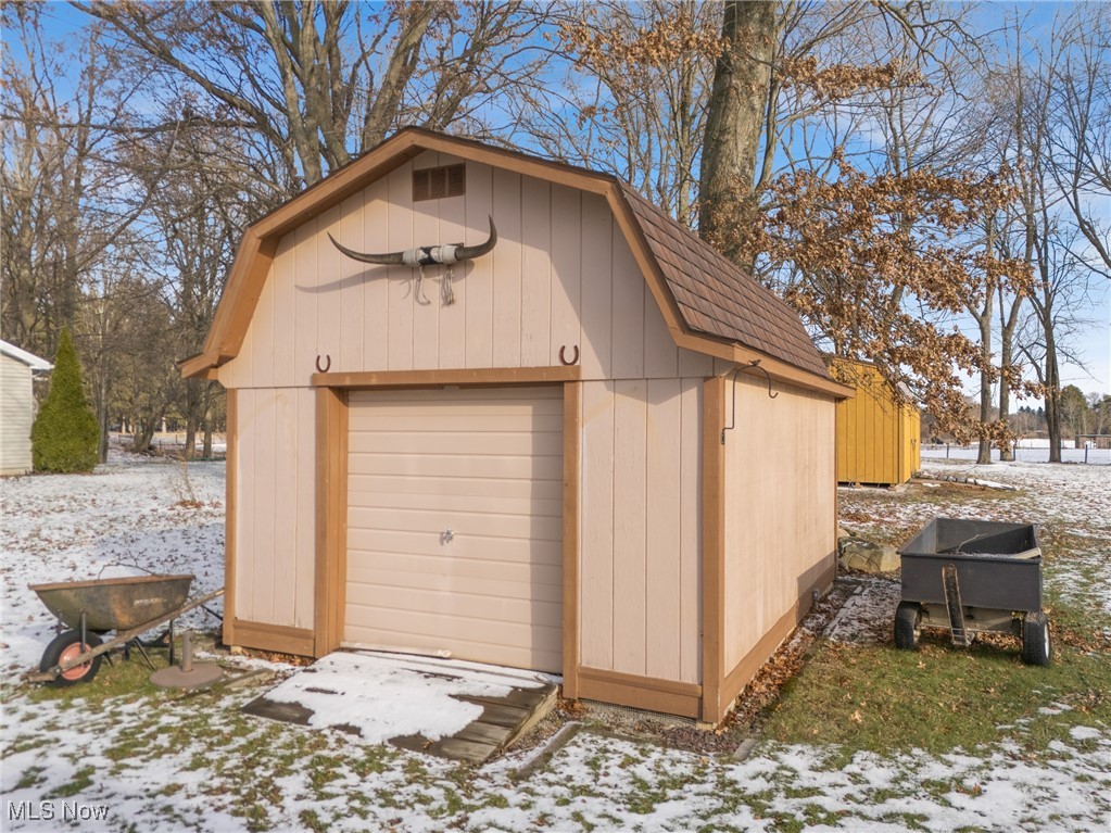 14965 Seacrist Road Salem, OH 44460 - Photo 29 of 43 Snow covered structure featuring a storage shed