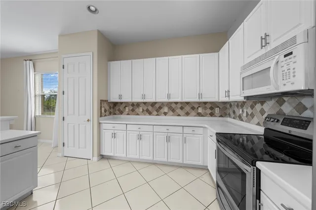 $449,900 | 2306 Bainmar Drive, Lehigh Acres, FL 33973