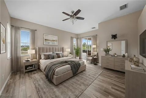 a bed room with bed and windows