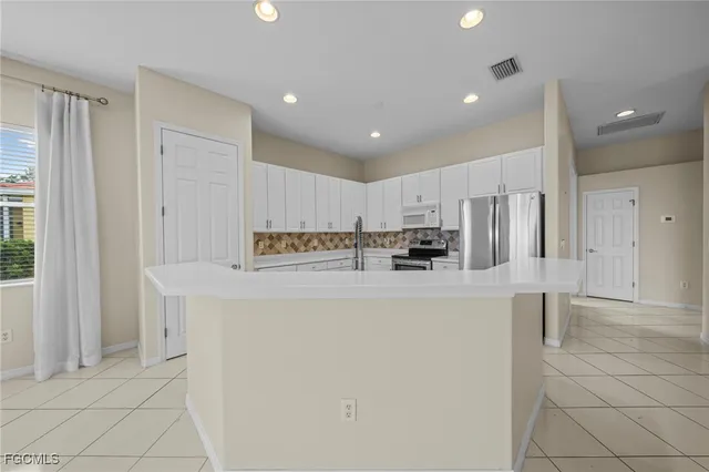 $449,900 | 2306 Bainmar Drive, Lehigh Acres, FL 33973