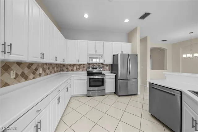 $449,900 | 2306 Bainmar Drive, Lehigh Acres, FL 33973