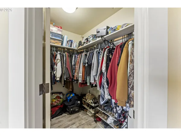 a view of a closet with storage
