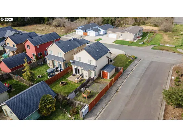 a aerial view of a house with outdoor space