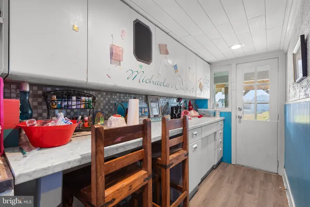 a room with sink and window