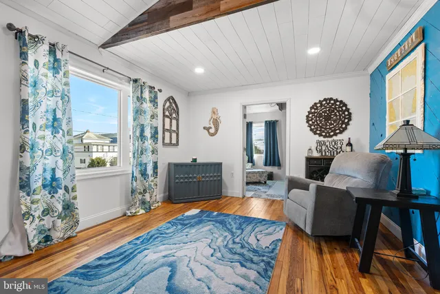a view of a living room with furniture