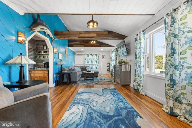 a bedroom with bed and a window